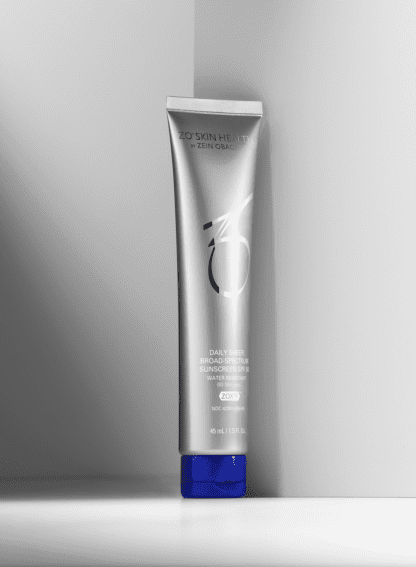 A tube of skin care product on the wall.