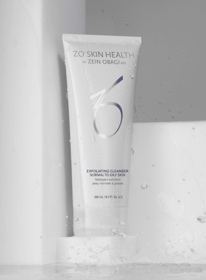 A tube of zo skin health exfoliating cleanser sitting on top of a shelf.