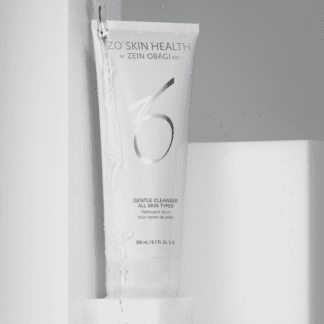 A tube of skin health lotion sitting in the corner.