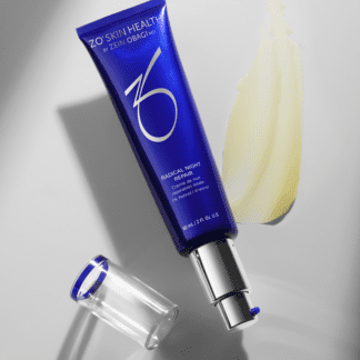 A tube of skin care next to a banana.